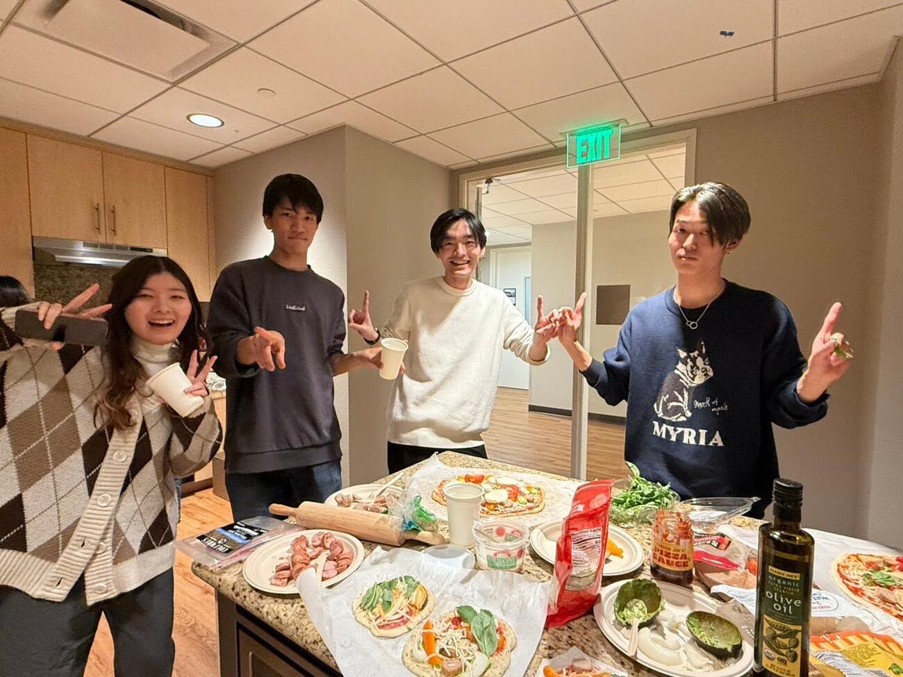 Students from the Stanford Japan Exchange Conference share food together during a cultural exchange event.