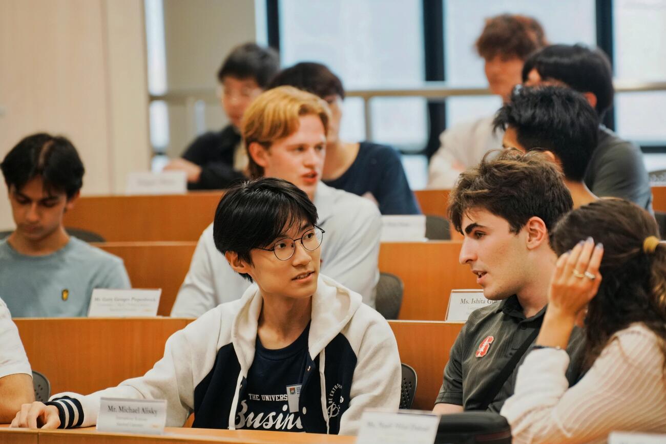 Students engage with one another in a classroom setting during the 2025 SCCEI Summer Study Program 