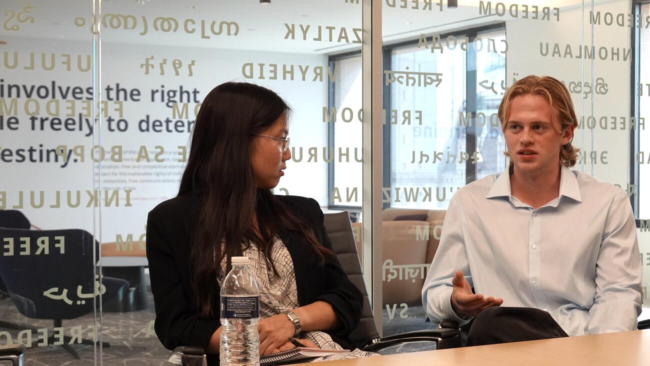 Garry Piepenbrock asks a question during the Honors College site visit to the National Endowment for Democracy.