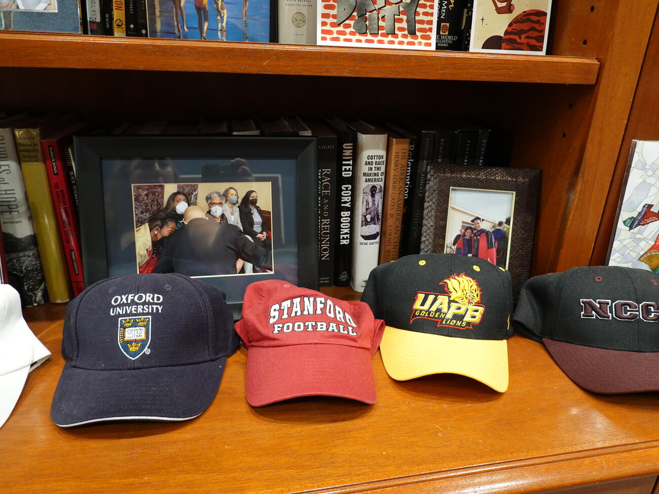 A Stanford Football cap is displayed in the Senator's office.