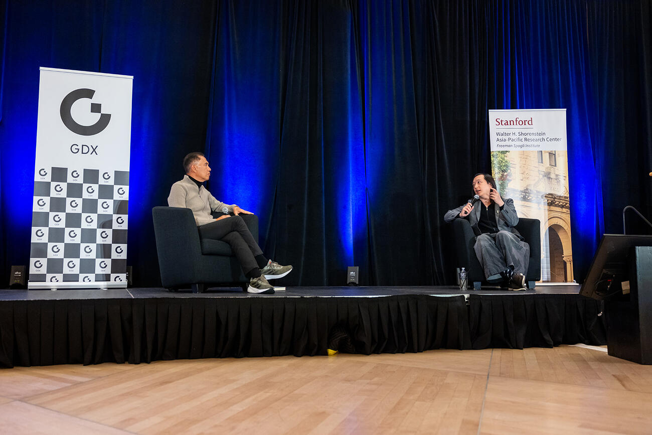 Audrey Tang and Gita Wirjawan during a fireside chat.