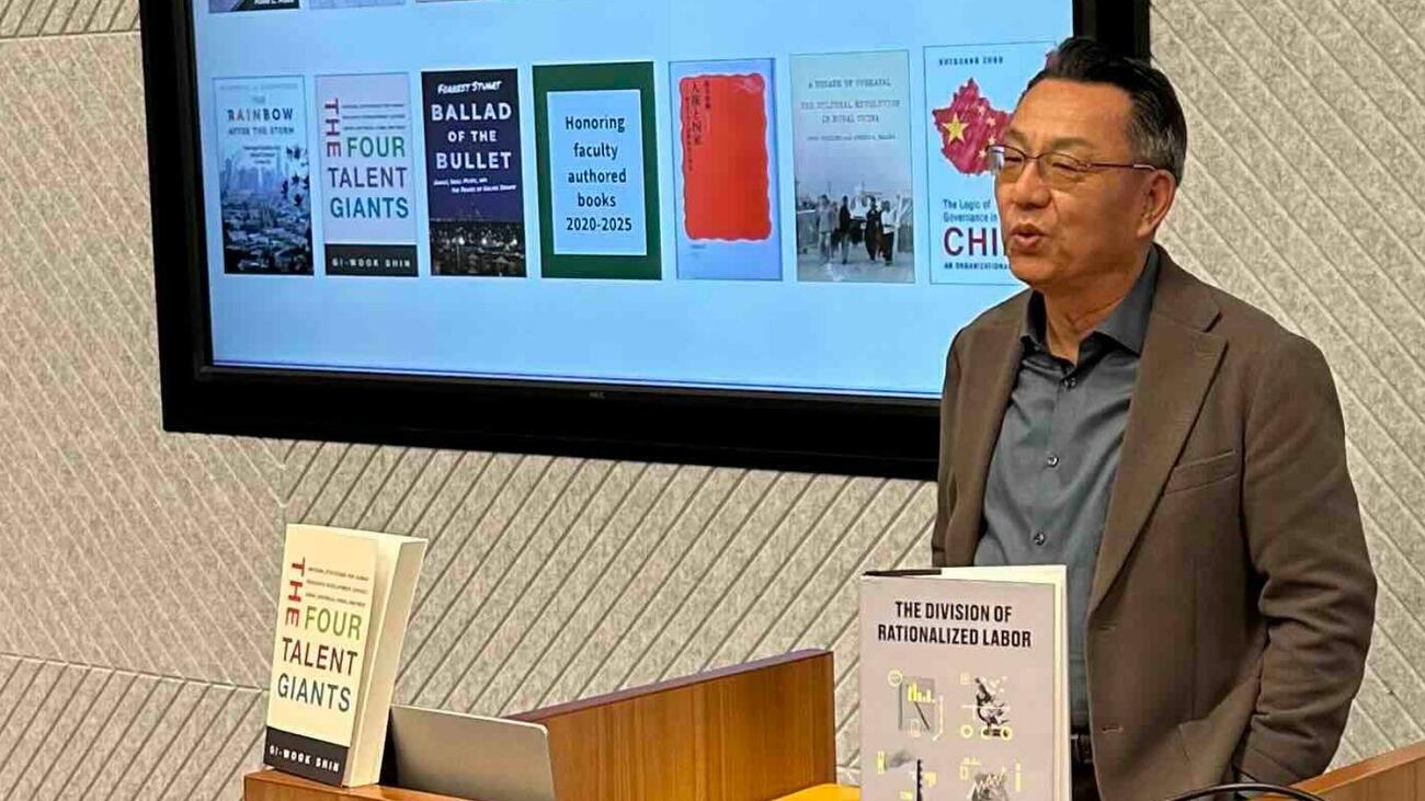 Gi-Wook Shin delivers remarks from a lectern.