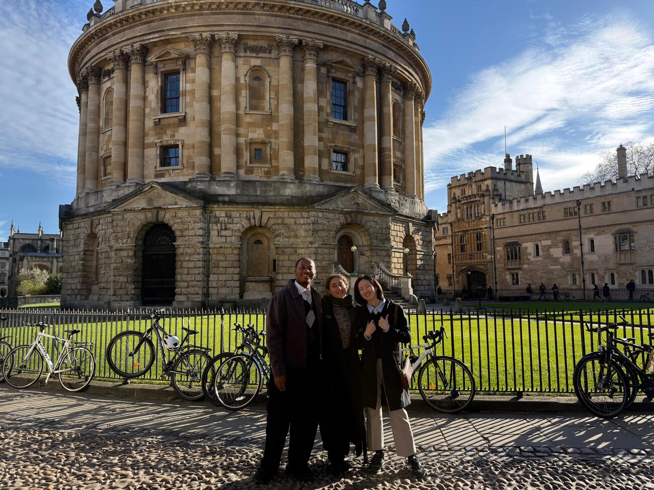 MIP students Tyler Smith, Malou van Draanen Glismann, and Shin Haeng Lee at the Radcliffe Camera at Oxford.