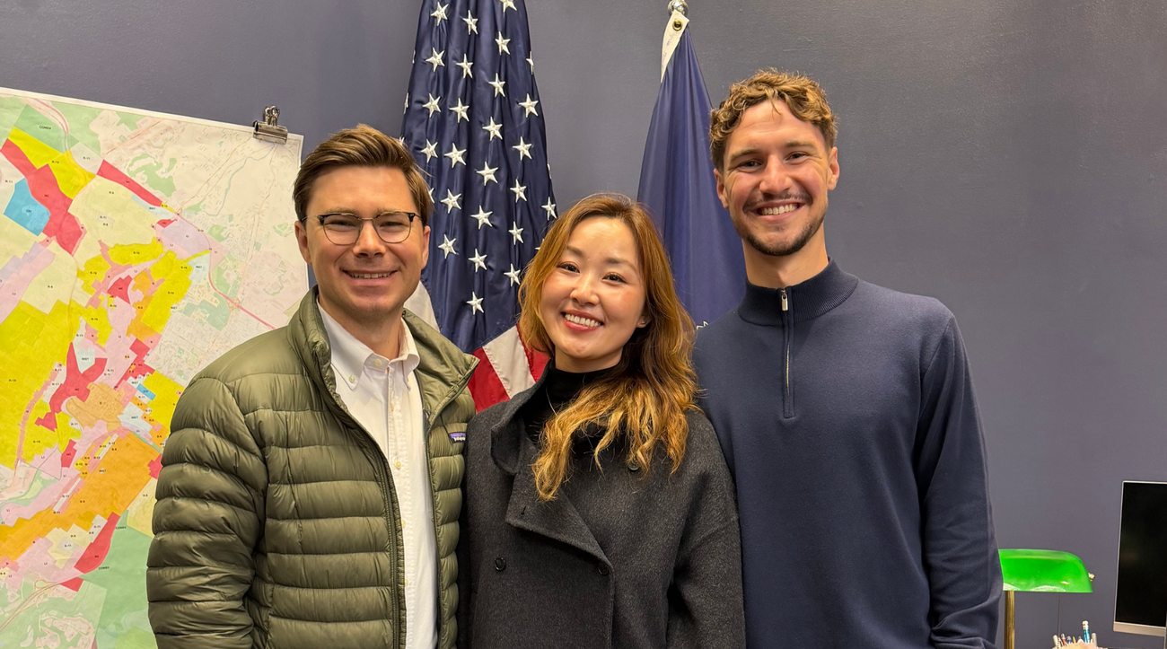 MIP students Tennyson Teece, Elena Kim, and Nik White in the city offices of Scranton, Pennsylvania.