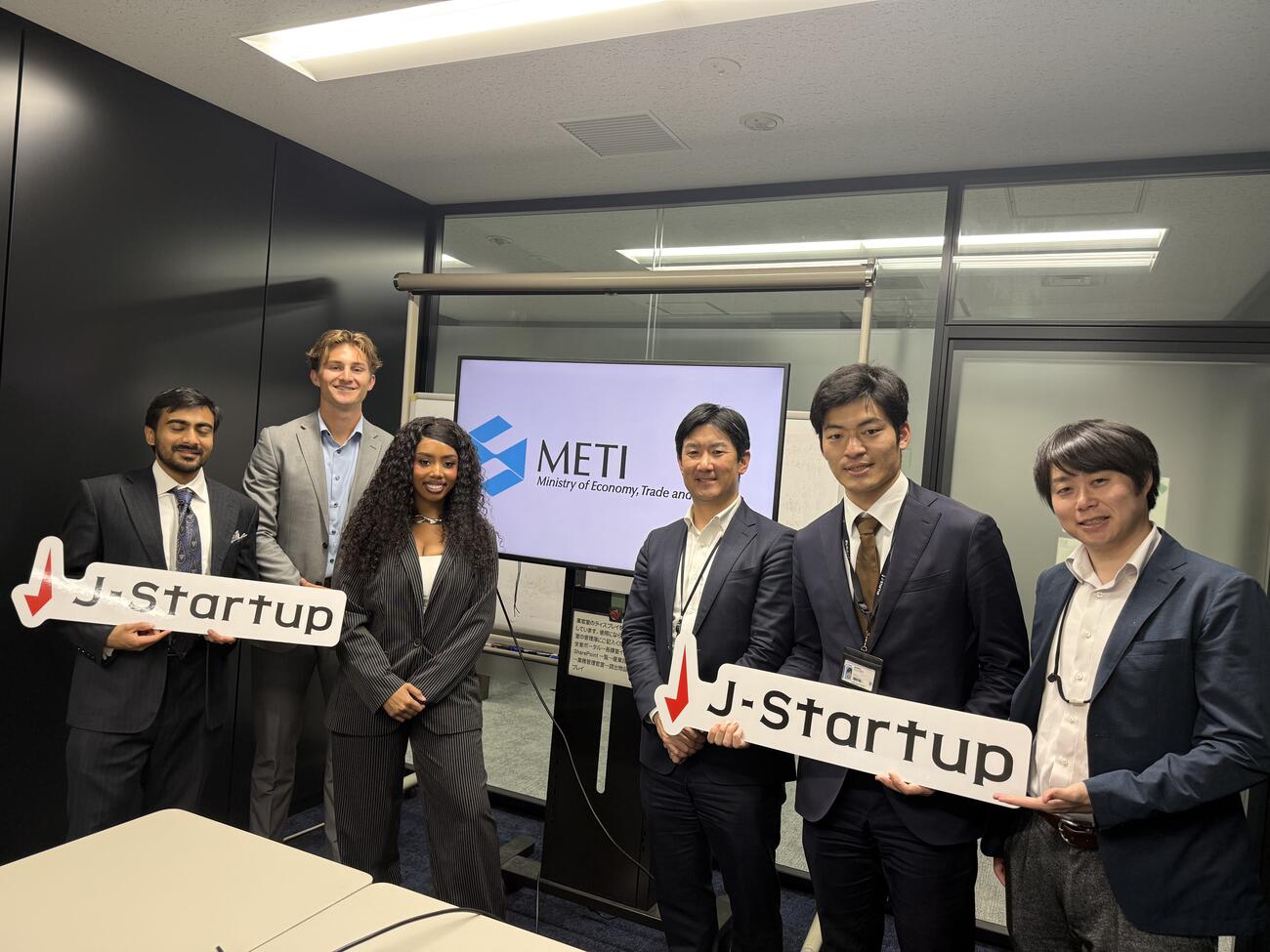 MIP students Humzah Khan, Luke Anderson, and Kylie Jones with their capstone partners at J-Startup.
