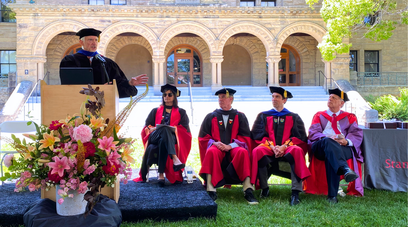 Jerry Kaplan speaks to the graduating class of 2026 of the Ford Dorsey Master's in International Policy as faculty members Chonira Aturupane, Joe Felter, Eric Volmar, and Michael McFaul look on.