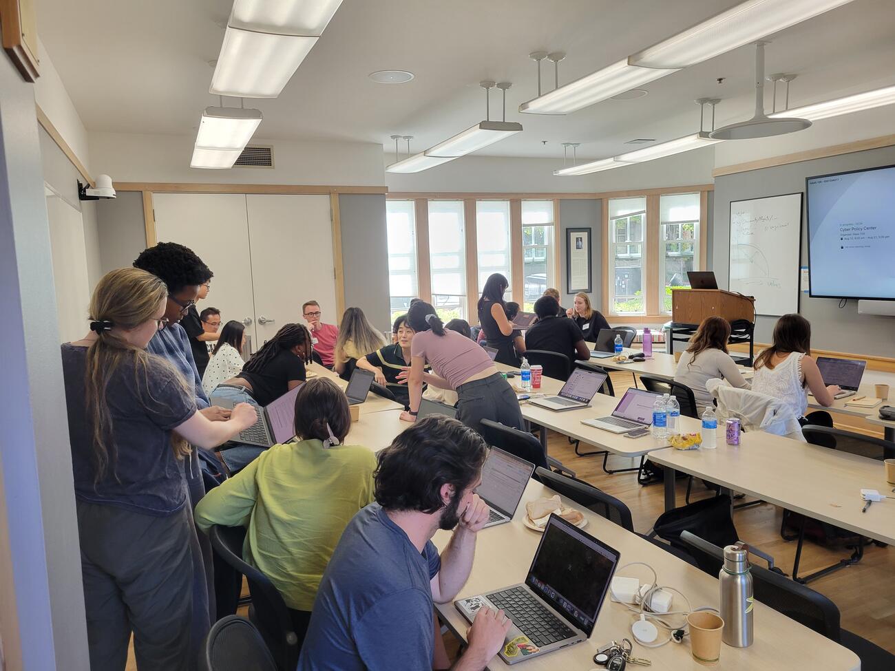 Students working in groups in a classroom