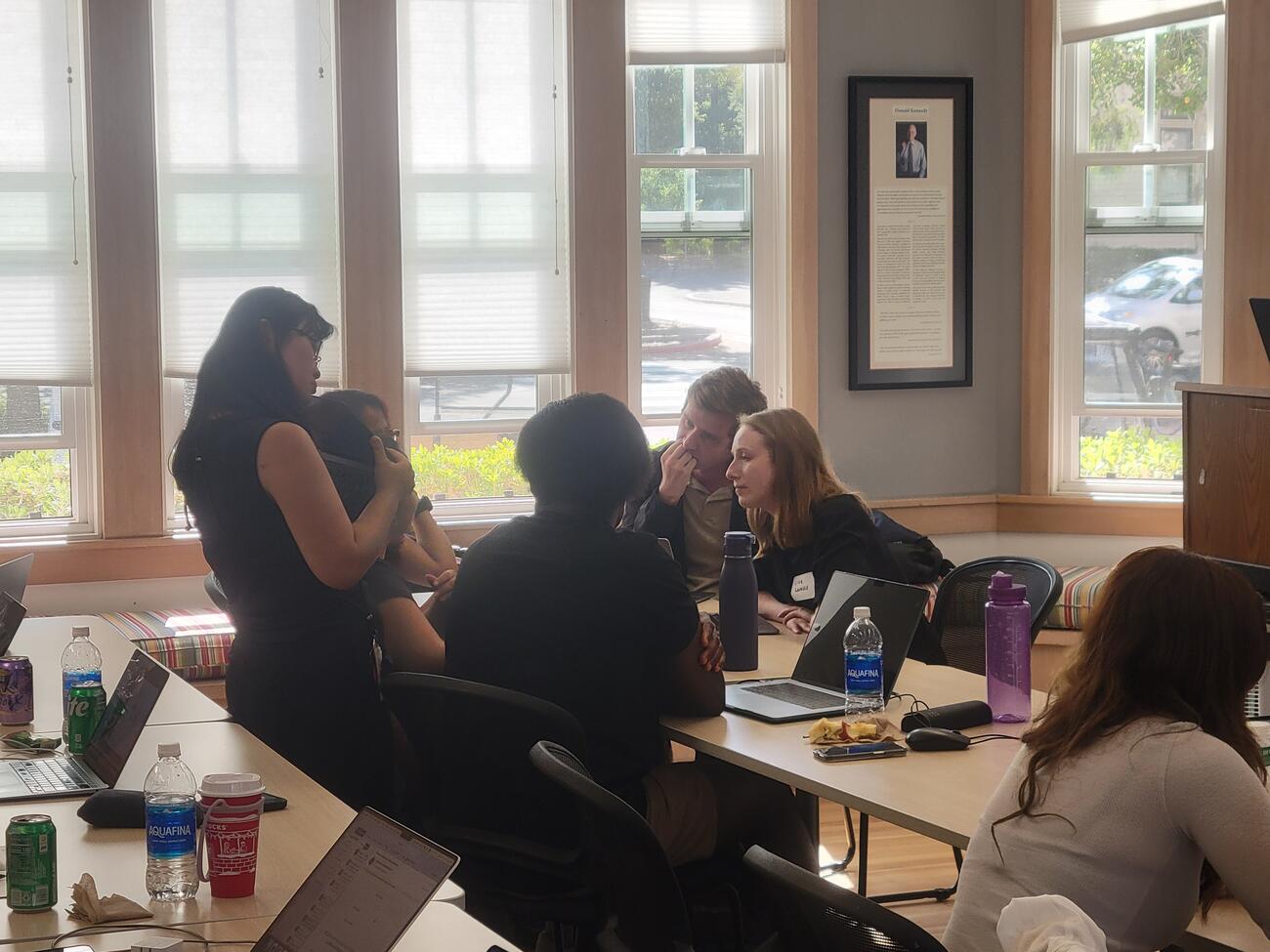 Students talking around a table