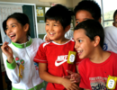 Multiethnic elementary school children smiling