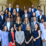 The Class of 2026 of the Ford Dorsey Master's in International Policy on the steps of Encina Hall at Stanford University.