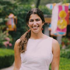 Nazli poses in a Chinese garden.