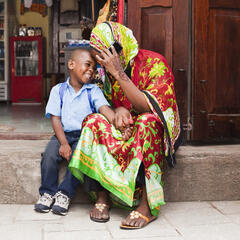 African mother and child sharing a laugh