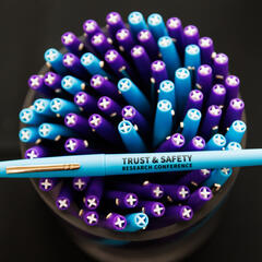 Photo of promotional pens in a container