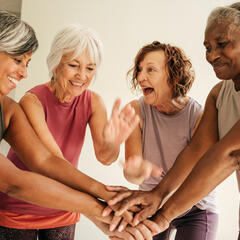 A photo of elderly women exercising together