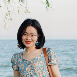 Haixin Mu headshot at a beach.