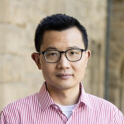 Headshot of Dr. Yiqing Xu.