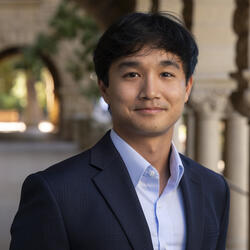 Headshot of MIP Student Boss Pornprasert