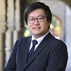 Headshot of Kazushi Sakai