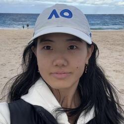 Danyue Liang headshot at the beach. 