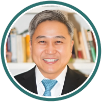 Hanming Fang headshot in a circle.