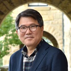 headshot of Sung Sup Ra