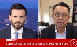 Gi-Wook Shin speaking to a BBS News host during a video interview.