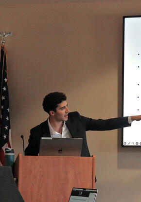 Firestone Medal winner Charles Sheiner, '25, presents his honors thesis.