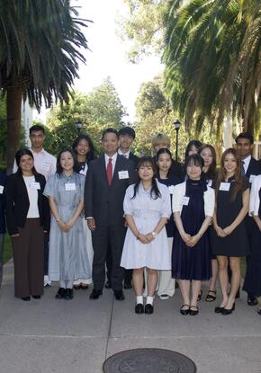 a group photo of students and instructors on campus