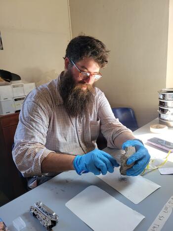 Nicholas Cullen conducting residue sampling