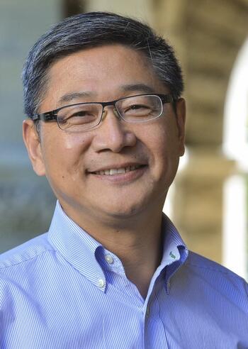 Headshot of Dr. Xueguang Zhou.