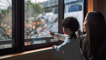 Feature figure showing woman and child in China