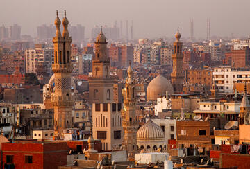 Mosques with Minarets and Traditional Architecture of Historic Cairo - stock photo