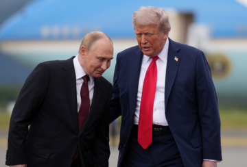 Vladimir Putin and Donald Trump in conversation on the tarmac of the Joint Base Elmendorf-Richardson on August 15, 2025 in Anchorage, Alaska.
