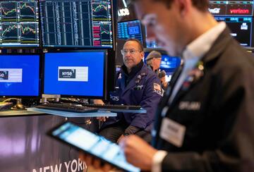 Traders work on the floor of the New York Stock Exchange (NYSE).