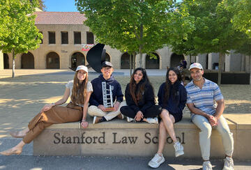 Founding executive board members of the Stanford Space Law Society, left to right: Samantha Potter, Cody Chenxi Wang, Radhey Soundarya Gnanesh, Ruchira Naik, and Kalon Joseph Boston.