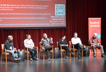 Michael McFaul, Marshall Burke, Colin Kahl, Or Rabinowitz, Larry Diamond, and Steven Pifer onstage during Reunion Homecoming 2025 for the panel, "Global Threats Today: What's at Stake and What We Can Do About It."