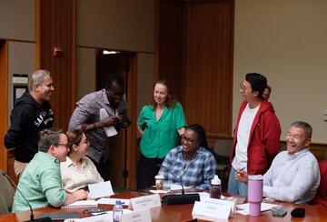 2025 Summer Fellows role play during a case study session