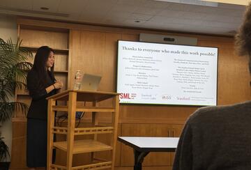 Angela Lee presenting her doctoral thesis