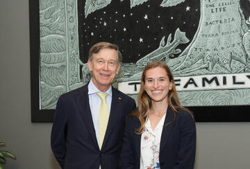 MIP Student Ella Genasci Smith posing with Senator John Hickenlooper