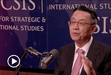 Gi-Wook Shin speaks to a microphone during a video podcast in a studio of the Center for Strategic and International Studies. 