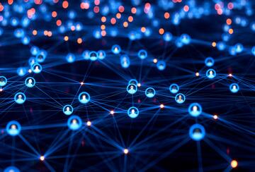 Illustration conveying the concept of social network connections, with connected avatars of anonymous people.