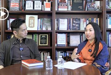 Kimberly Hoang and Kiyoteru Tsutsui seated in an office during a recorded podcast conversation.