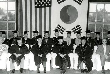 The ceremony for the conferment of an Honorary Doctorate (Law) on the Honorable Arthur E. Schneider as part of a cooperative project between the University of Minnesota and Seoul National University 
