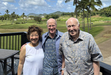 three people standing