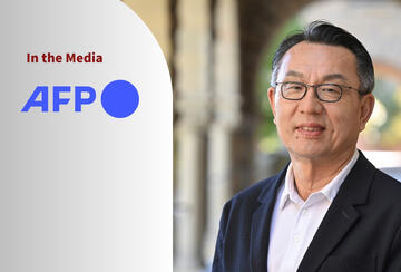 Portrait photo of Gi-Wook Shin and logo of news agency AFP with text "In the Media."