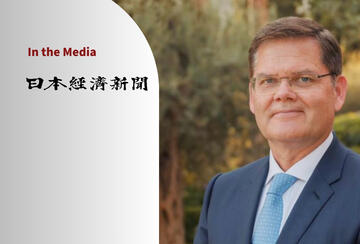 Portrait photo of Curtis Milhaupt and masthead of the Nikkei Shimbun.