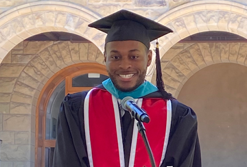 Tyler Smith ('26) addressing the graduating class of 2026 of the Ford Dorsey Master's in International Studies (June 14, 2026).