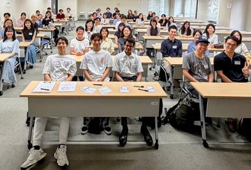 classroom full of students seated at desks