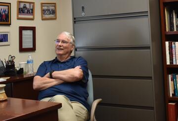 Thomas Fingar in his office