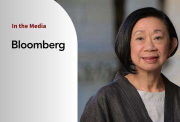 Portrait of Jean Oi and a logo of Bloomberg. Text: "In the Media."